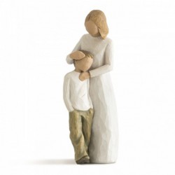 Woman figurine holding boy