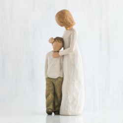 Woman figurine holding boy