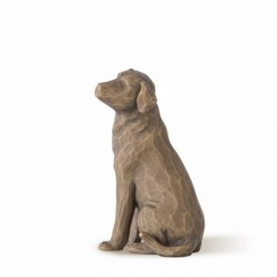 Brown dog figurine sitting turning to the side
