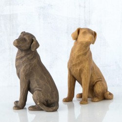 Brown dog figurine sitting turning to the side