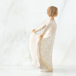 Brunette angel figurine in white dress with gold embellished diamonds