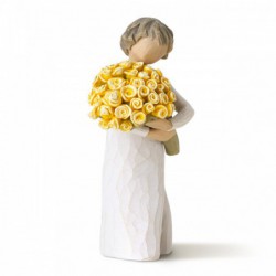 Front view of little girl with short brown hair holding a large bouquet of yellow roses