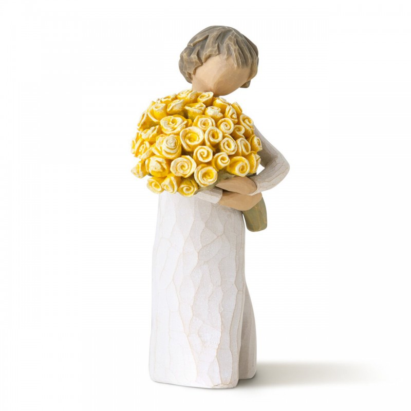 Front view of little girl with short brown hair holding a large bouquet of yellow roses