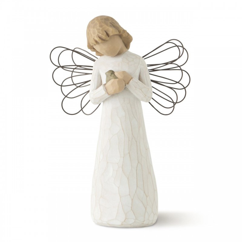 Angel figurine holding rock