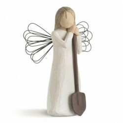 Angel figurine holding shovel