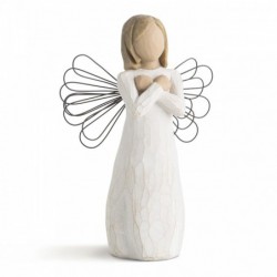 Angel figurine with arms crossed on her chest