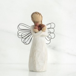 Angel figurine holding rocks
