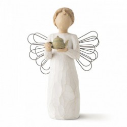 Angel figurine holding tea pot