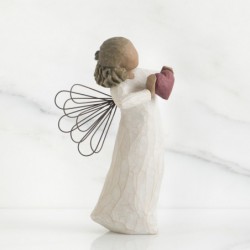 Faceless woman angel figurine wearing white dress holding pink heart up