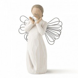 Angel figurine holding up blue sparkly star