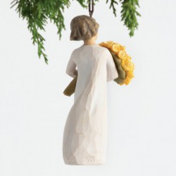  female figurine in cream dress