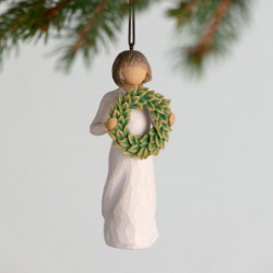  holding green wreath of magnolia leaves. Hook and loop affixed to figure`s head